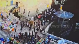 Israel: A vibrant atmosphere at Damascus (Shechem) Gate, as worshippers and residents gather in a secure environment