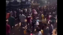 Palestine: Massive crowds in Gaza gather around a tanker delivering potable water