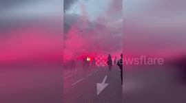 Mounted escorts Atletico Madrid team bus before match against Real Madrid