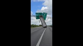 Henrico: Driver expertly removes huge trailer from overpass sign following accident