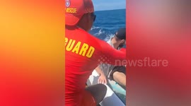 Two Russian tourists rescued from rough sea after surfboards are swept away