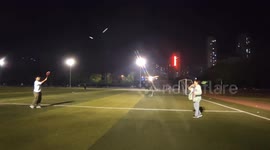China: Playing Two Shuttlecocks At The Same Time