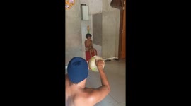 Son Throws Soccer Ball At Father's Face