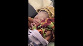 The moment a mother in Indonesia gave birth to a baby boy on a plane