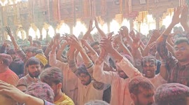 Vibrant scenes as devotees celebrate Holi in Barsana - India's festival of colours