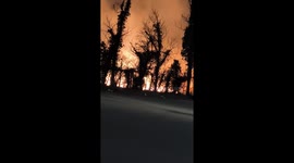 A severe fire at Camp Small in Baltimore closes highways as onlooker captures intense damage.