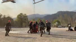 Guatemala: Guatemalan Air Force Battles Raging Forest Fire with Helicopter in Quiché
