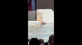 Shocked tourist watch fire engulfing Thai diving boat as search continues for missing British woman