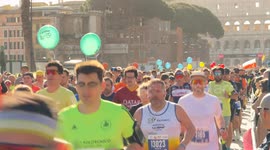 Runners start the race with the Colosseum in the background during the Acea Run Rome The Marathon in Rome.