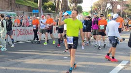 Runners reach the starting area before starting the Acea Run Rome The Marathon in Rome.