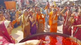 Rajasthani women beat men on Holi in India unique festival of colours