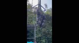 Tourists try giant playground swing in Malaysia