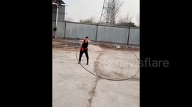 Man, 52, spins 40kg steel hula hoop in impressive display of strength