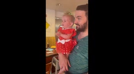 Toddler's priceless reaction to meeting Mickey Mouse during family visit to Chef Mickey's