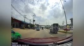 Car slams brakes to avoid truck moving into wrong lane