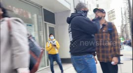 Counter protester taunts Palestinian marchers at Emergency protest for Gaza in Chicago