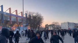 Rival football fans fight outside stadium in France