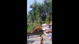 Landslide crashes down hillside next to homes in Indonesia