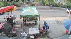 Street food trolley catches fire on roadside in Thailand