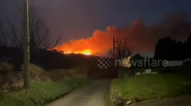Wildfire with 40ft flames rips through hillside in Wales