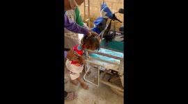 Toddler with her head stuck in motorcycle trailer rescued by family