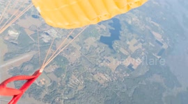 Group of 20 skydivers perform dazzling displays with deployed parachutes at 100mph