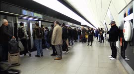 A General View Of Commuters Boarding A Elizabeth Line Train At Canary Wharf Station
