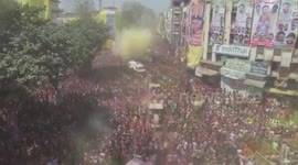 Ambulance drives through crowds of devotees at Hindu festival