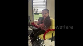 Girl Beams After Haircut
