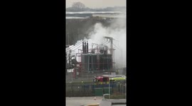 Heathrow fire doused with water cannon as airport chaos erupts
