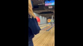 'Funny Bowling Fail' - Slip on alley results in a perfectly missed strike
