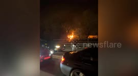 Drivers pull over to watch the substation fire near Heathrow airport
