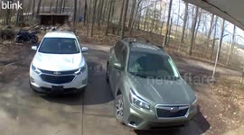Reversing Car Backs Into Parked Motorcycle