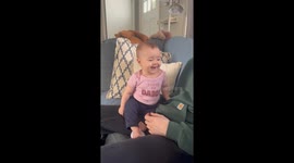 Baby Laughs At Barking Dog