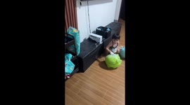 Toddler covers hands and piggy bank with Sudocrem in Batangas, Philippines