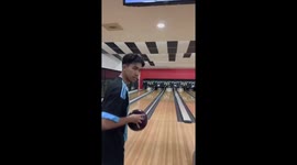 Man slips and falls after losing grip on bowling ball in Terengganu, Malaysia