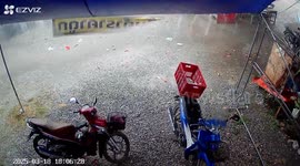 Summer storm causes carnage as it whips through market stalls