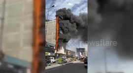 Iraq: Fire Engulfs Commercial Building in West Baghdad