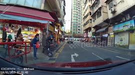 Electric scooter fail captured on dashcam in Hong Kong