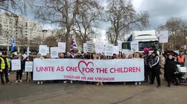 We march for the children in London, England