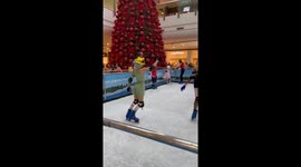 Girl struggles to balance on ice skates in São Luís