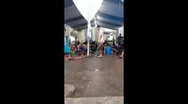 Lightning strikes near people during a wedding reception in Jember, Indonesia