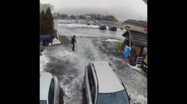 Person struggles to walk on slippery ground in Sweden