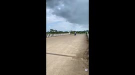 Motorcycle stoppie attempt ends in crash in Raipur, India