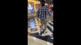 Tourists flee as mass brawl erupts between gangs at Thai shopping mall