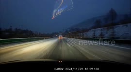 Jackknifed lorry overturns and blocks icy road in China