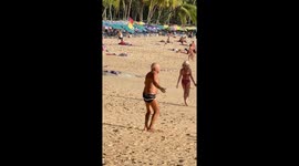 Pensioner is living his best life... spinning round in circles on beach
