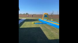 Family Slip N' Slide turns chaotic with overconfident grandpa's adventurous attempt