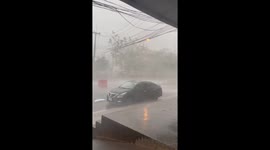 Tropical storm batters home as temperature rises in Thailand