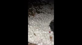 Golf Ball-Sized Hail Breaks Window and Cracks Windshield